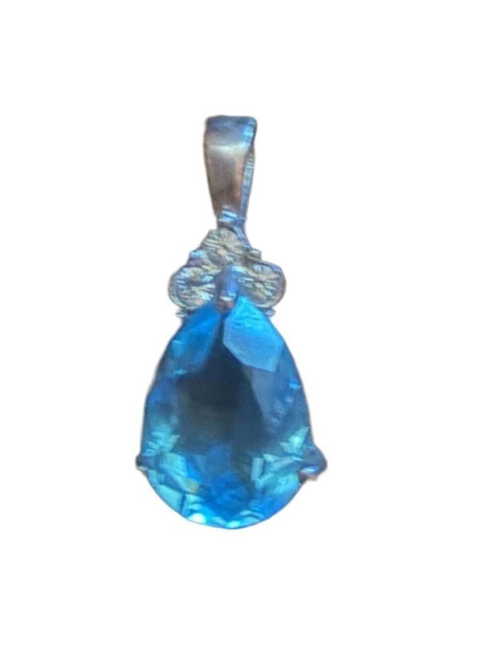 Pear Shaped Blue Topaz Pendant in White Metal